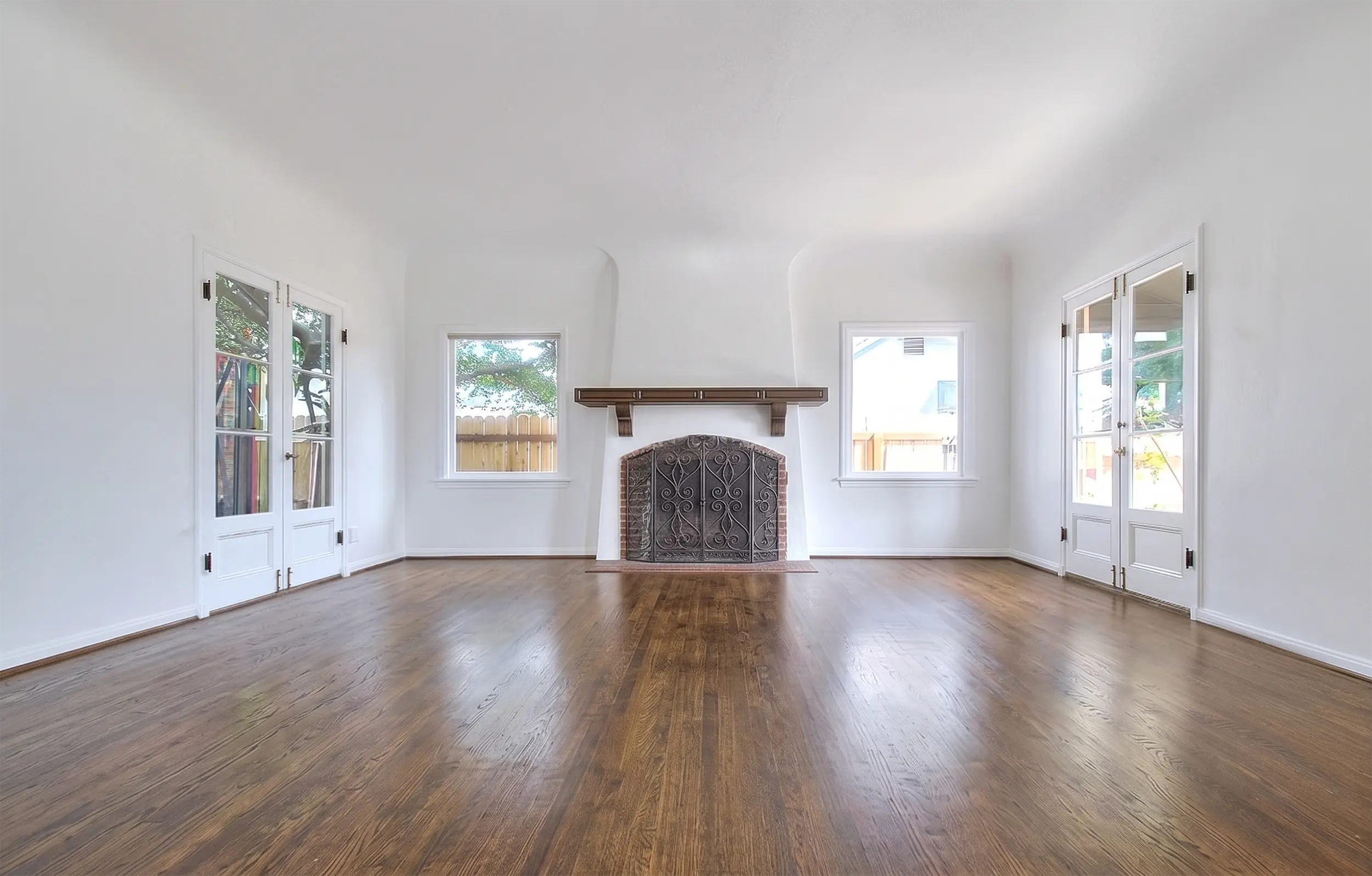 Before staging - Living room with fireplace mantel