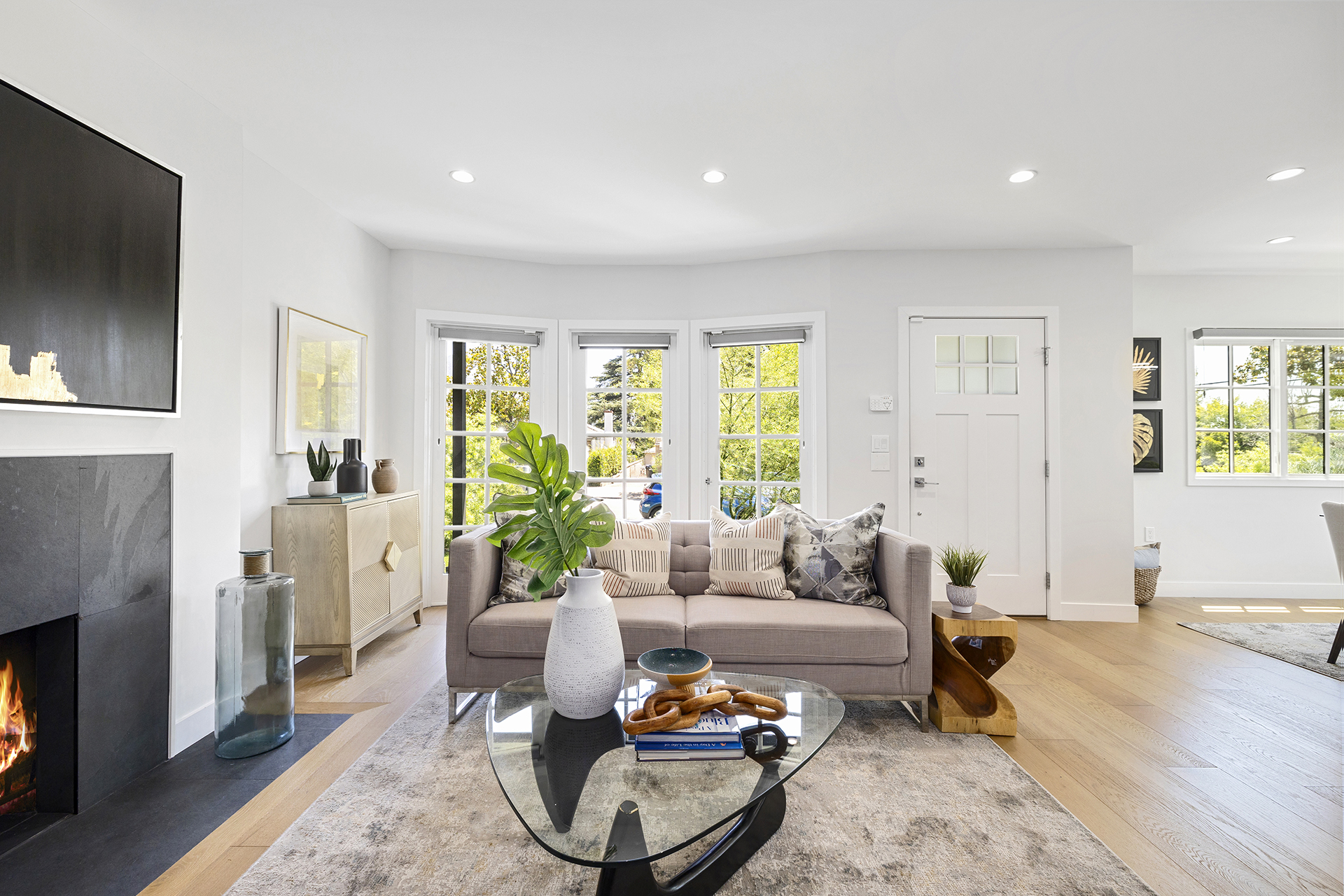Staged living room with bay window — home staging for real estate