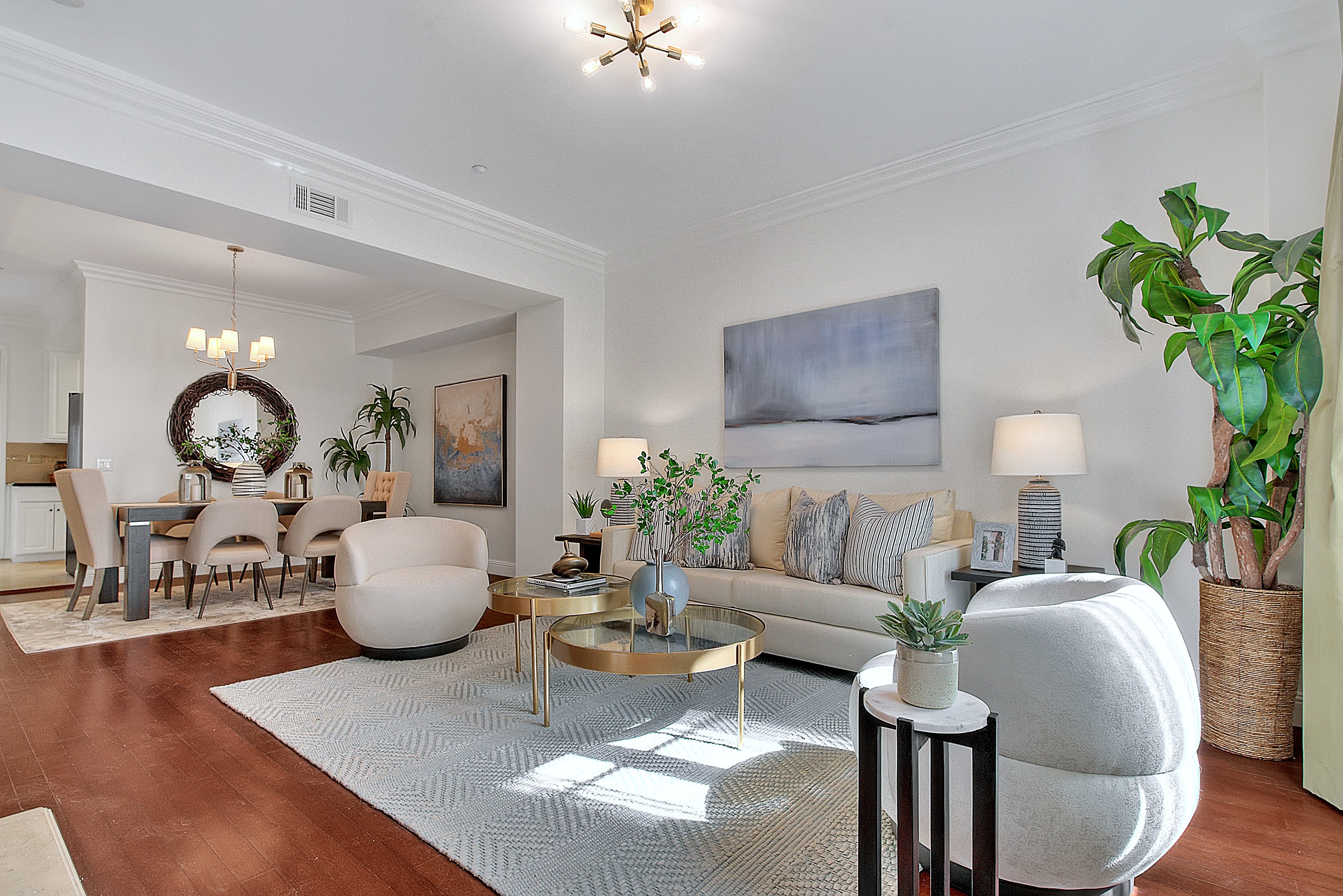Staged living room with sputnik chandelier — home staging
